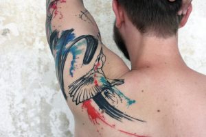 Lina Tattoo Upper Arm Shoulder Blade Bird Blue Green Red Black